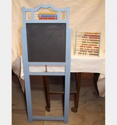 Wooden Abacus And Chalkboard