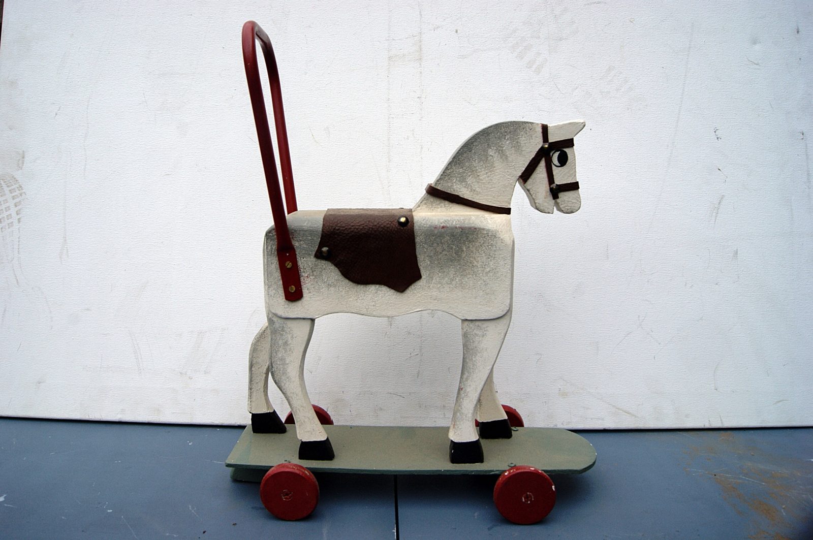 0021247 Wooden Horse On Wheels Childs Toy ( H 51cm x 17 x 40 ) Stockyard Prop and Backdrop Hire